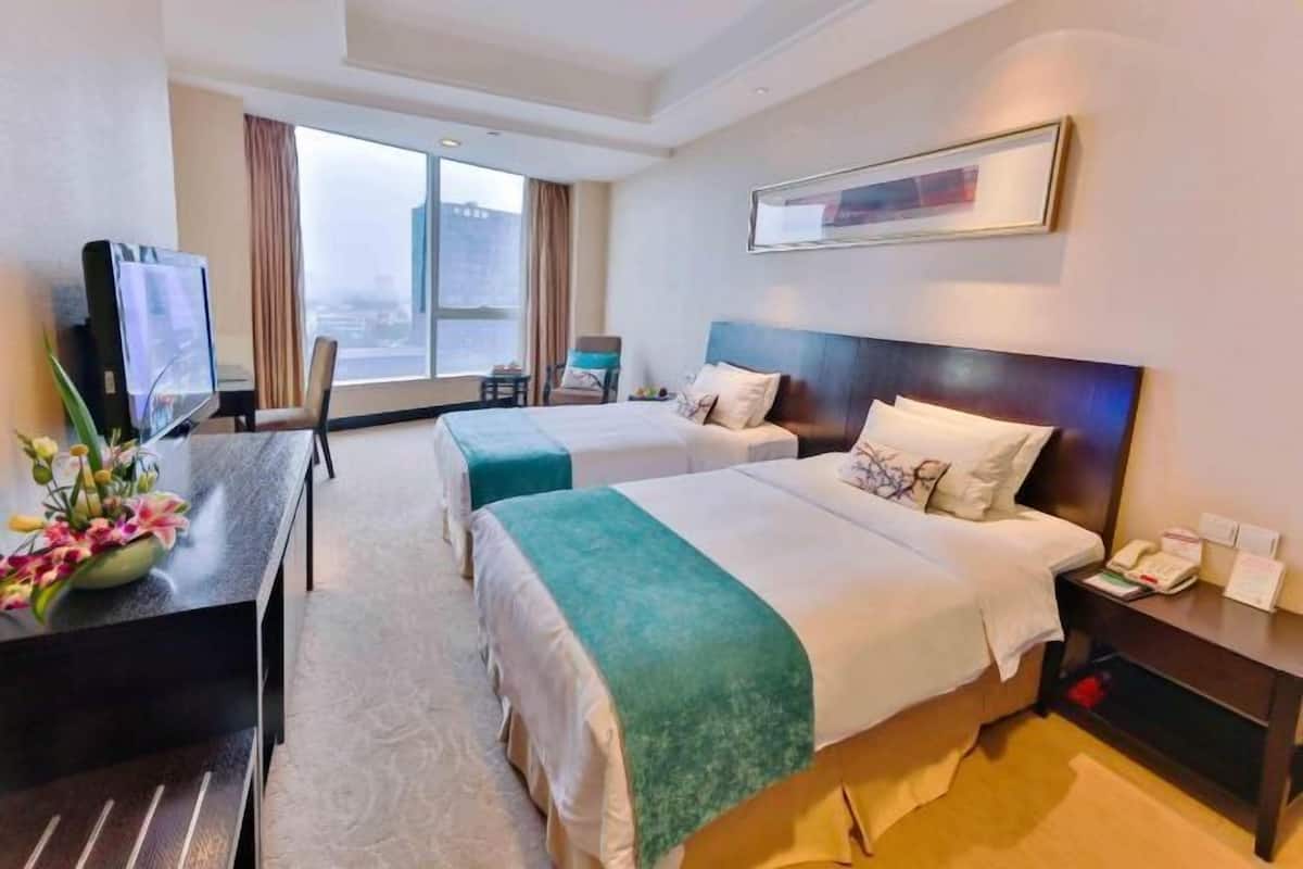 Ropa de cama de alta calidad y minibar
