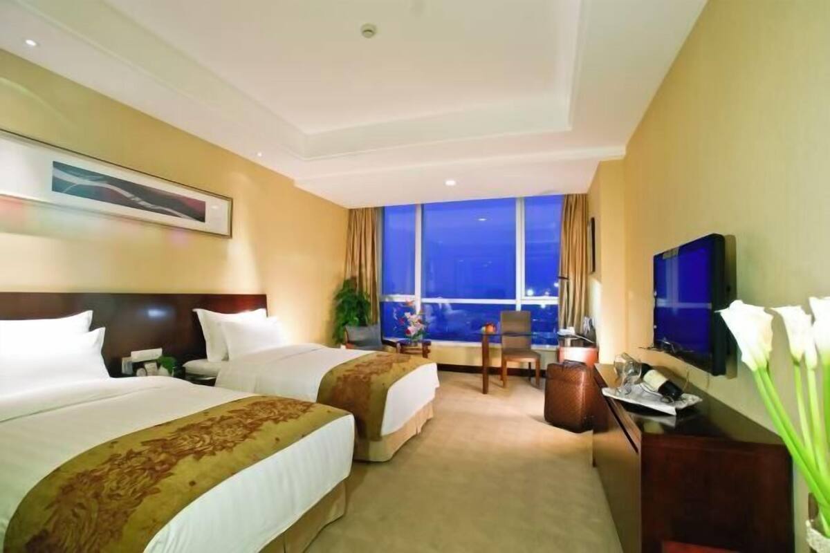 Ropa de cama de alta calidad y minibar 