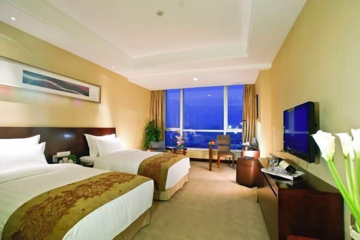 Ropa de cama de alta calidad y minibar