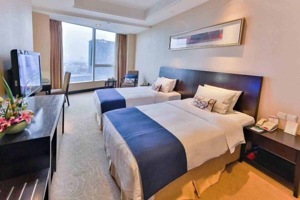 Ropa de cama de alta calidad y minibar 