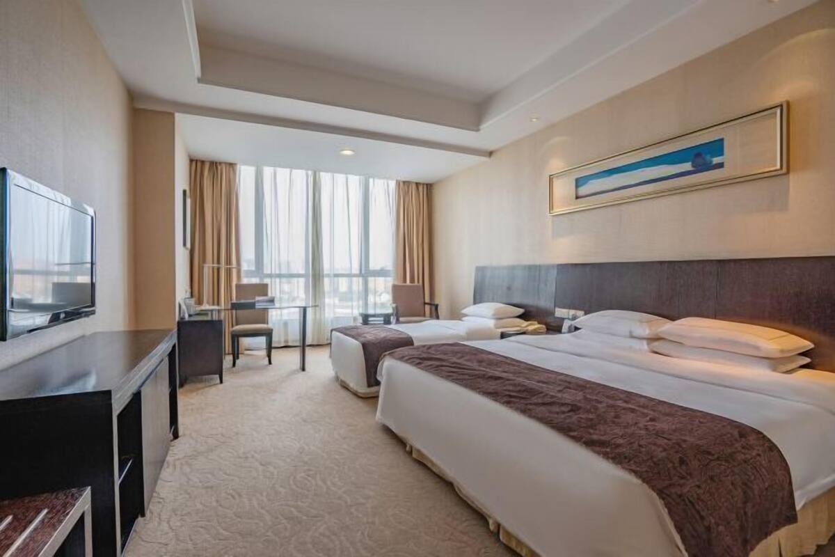Ropa de cama de alta calidad y minibar 