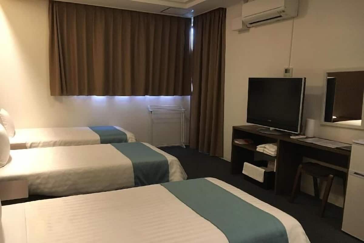 Blackout drapes, iron/ironing board, free WiFi, bed sheets