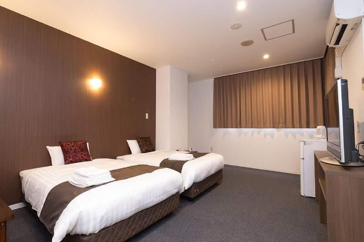 Blackout drapes, iron/ironing board, free WiFi, bed sheets