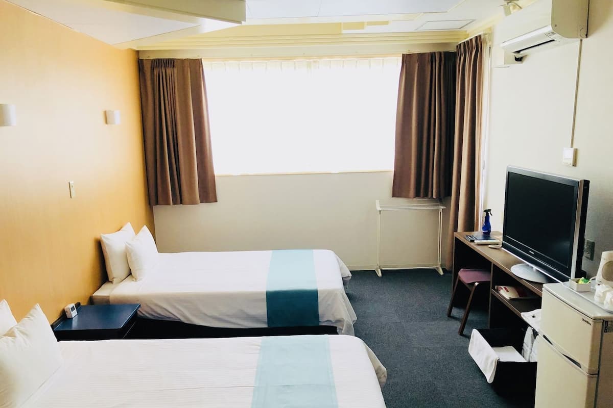 Blackout drapes, iron/ironing board, free WiFi, bed sheets