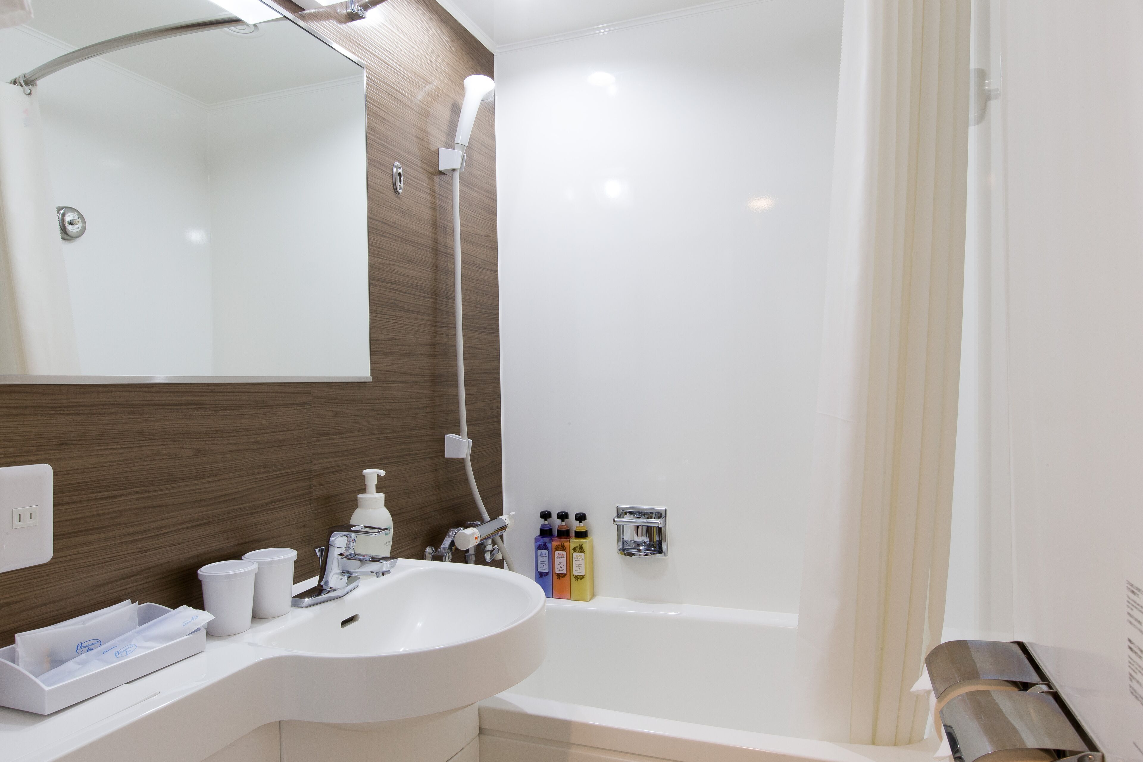 combined shower/bathtub, free toiletries, hair dryer, bathrobes