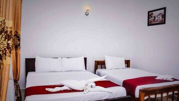 Basic Double Room, Garden View | Minibar, in-room safe, desk, iron/ironing board