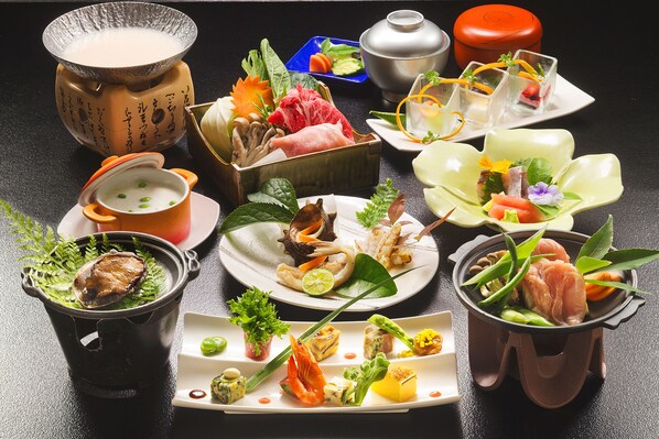 A variety of dishes and food items arranged on a table. - Resort Hotel Mihagi (Hagi)