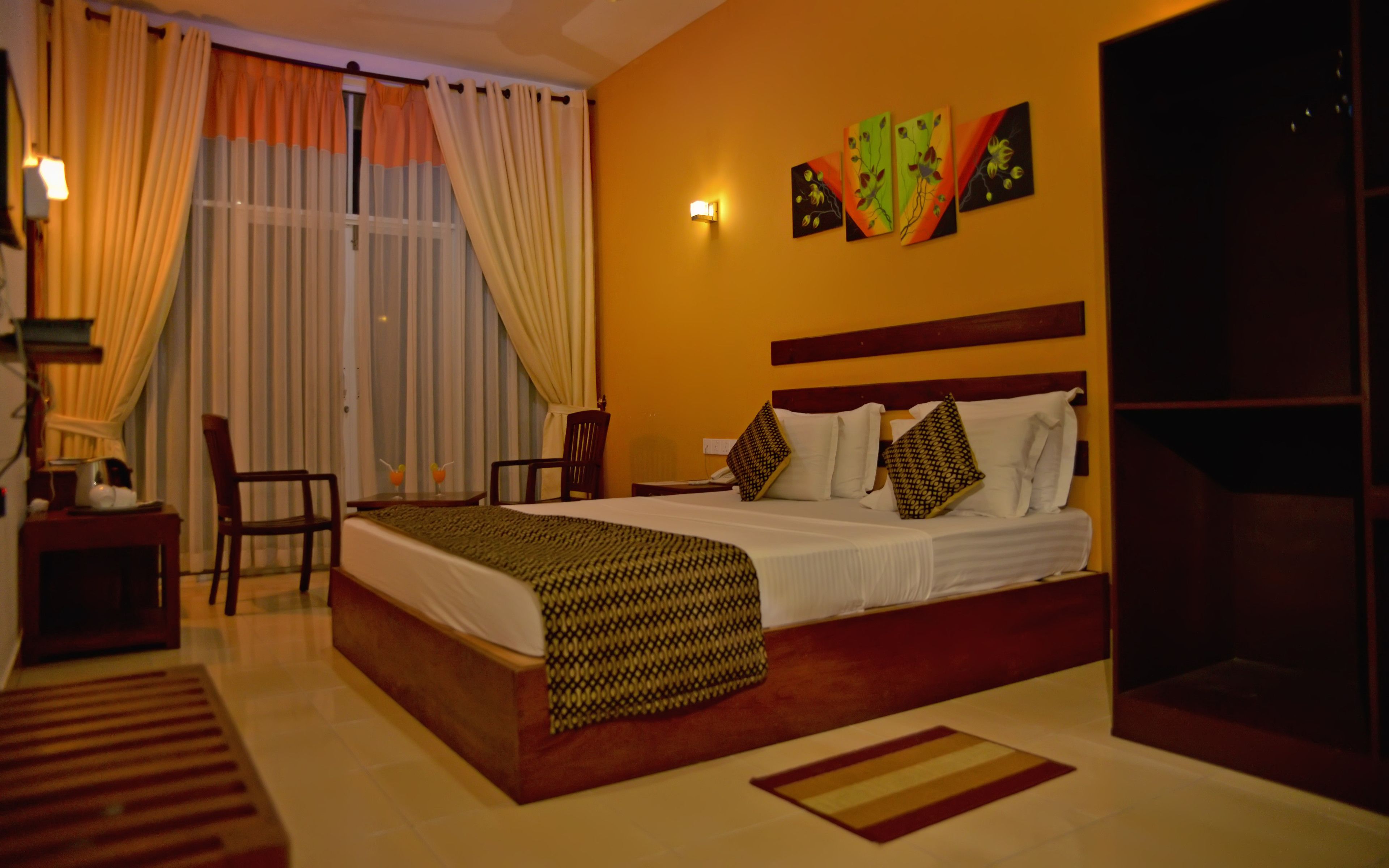 Deluxe Double Room, Pool View | Minibar, in-room safe, desk, soundproofing