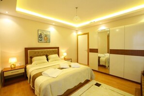 Desk, soundproofing, iron/ironing board, free cots/infant beds