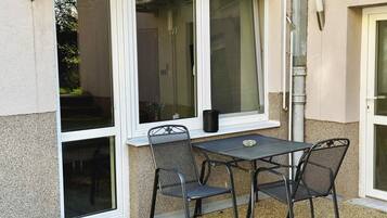 Tweepersoonskamer, niet-roken, kitchenette | Terras