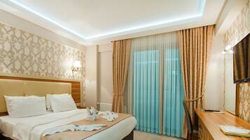 Standard Room | Premium bedding, minibar, in-room safe, desk
