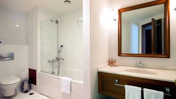 Bathtub, deep soaking tub, designer toiletries, hair dryer