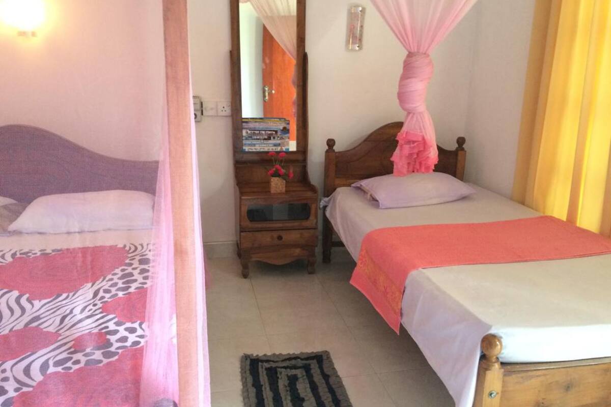 Deluxe Double Room, 1 Bedroom, Garden View, Beachside | Desk, soundproofing, iron/ironing board, cribs (surcharge)
