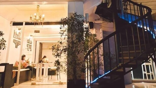 A restaurant named "SP Place" with a staircase and indoor seating visible. - SP Place Hotel (Ko Chang)