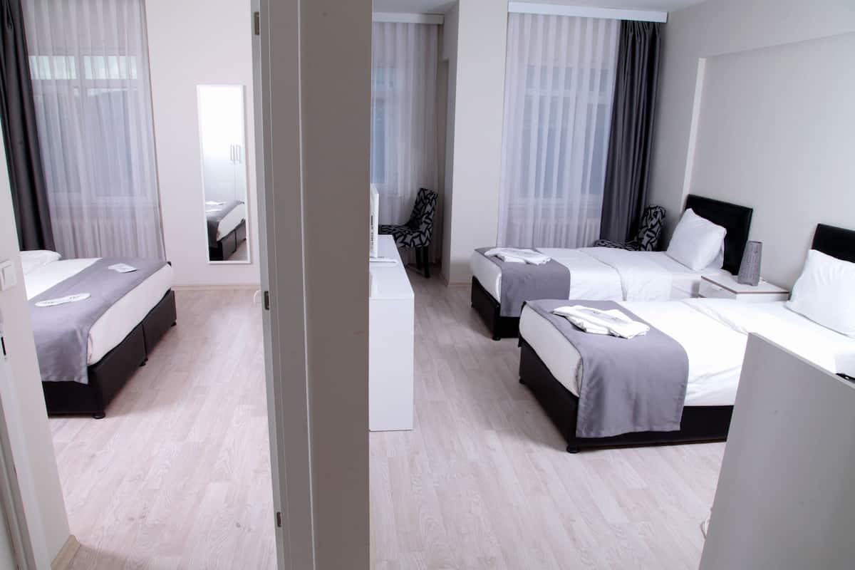 In-room safe, laptop workspace, blackout curtains, iron/ironing board
