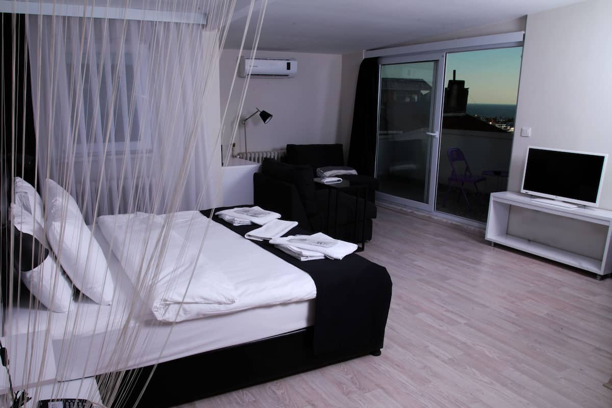 In-room safe, laptop workspace, blackout curtains, iron/ironing board