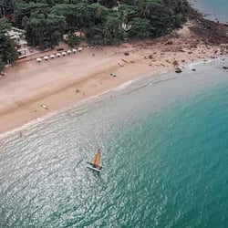 On the beach, windsurfing, kayaking