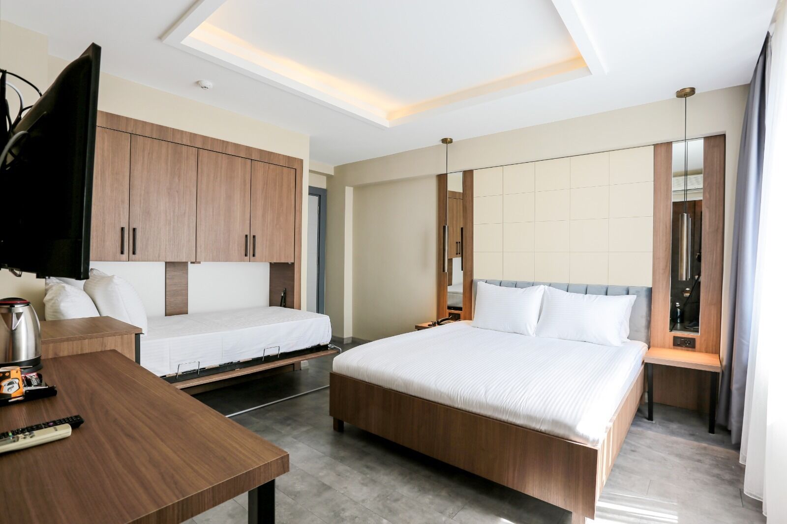 Neljän hengen standard-huone | Egyptinpuuvillaiset lakanat, ylelliset vuodevaatteet, minibaari