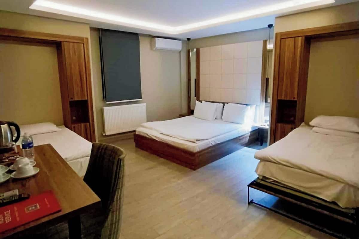 Standard Quadruple Room | Egyptian cotton sheets, premium bedding, minibar, in-room safe