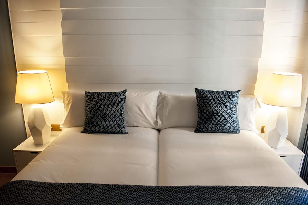 Premium bedding, down duvets, in-room safe, blackout curtains