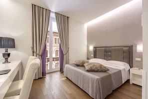 Ropa de cama de alta calidad, minibar, caja fuerte