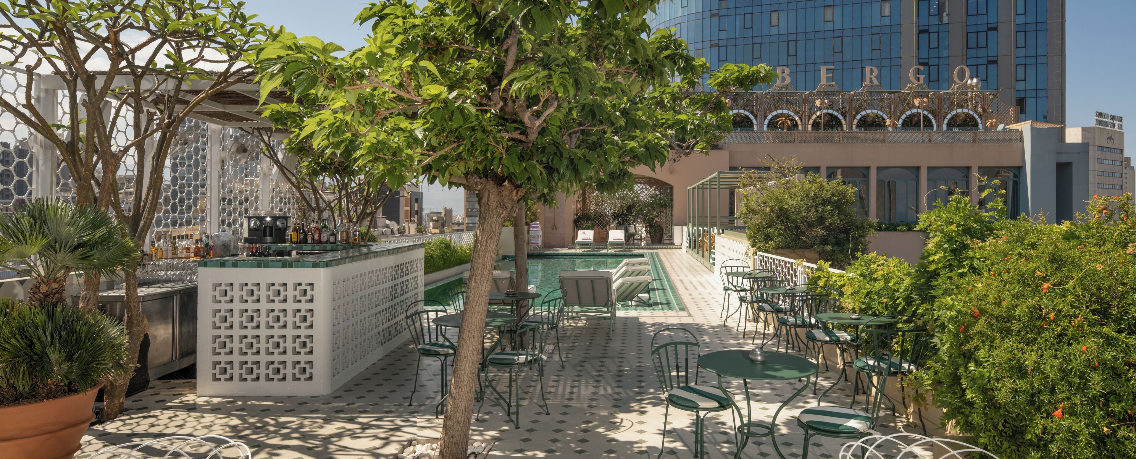 outdoor pool, open 9:00 am to 6:00 pm, pool umbrellas, pool loungers