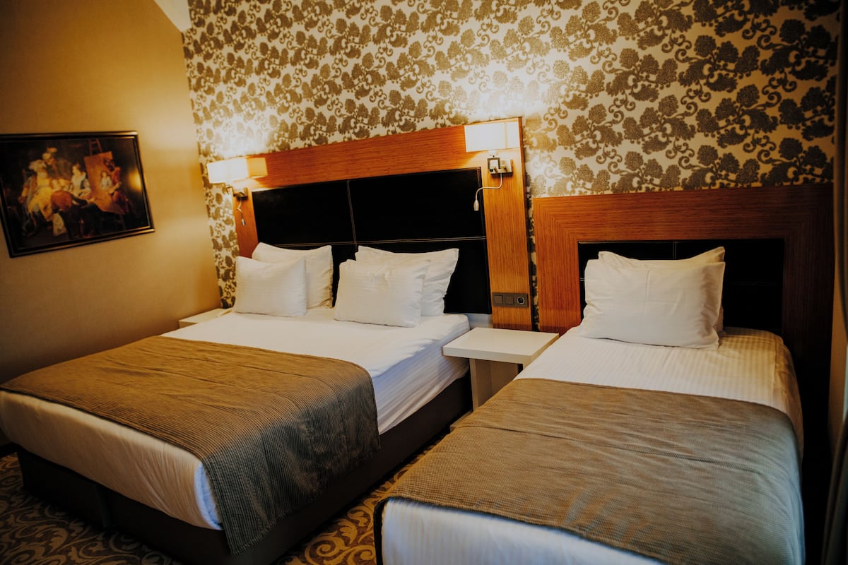 Deluxe Triple Room | 2 bedrooms, minibar, in-room safe, soundproofing