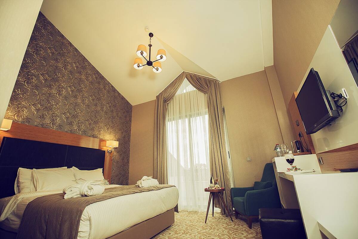Superior Room, Smoking, Mountain View | Minibar, in-room safe, soundproofing, iron/ironing board (on request)