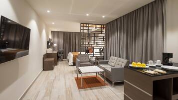 Suite Larga Estancia | Ropa de cama de alta calidad y caja de seguridad en la habitación