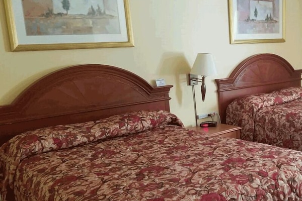 Comfort Room, 2 Double Beds | Bathroom | Combined shower/tub, hair dryer