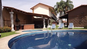 Outdoor pool, pool loungers