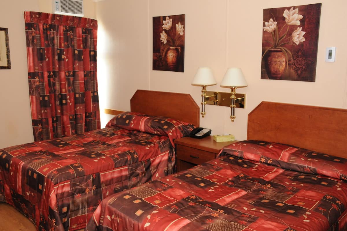 Standard Room, 2 Queen Beds | Desk, iron/ironing board, free WiFi, bed sheets