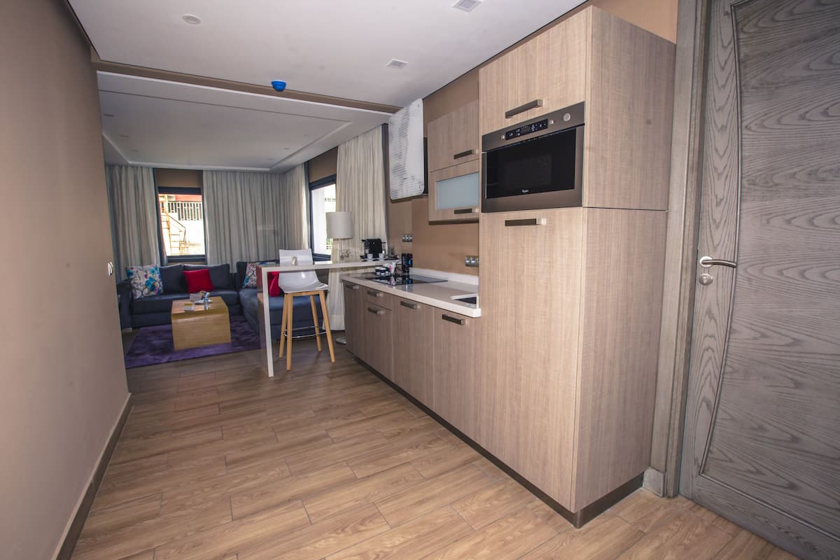 premium suite | private kitchen | full-sized fridge, microwave, espresso maker, electric kettle