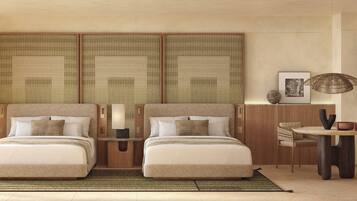 Luxe beddengoed, een minibar met enkele gratis items