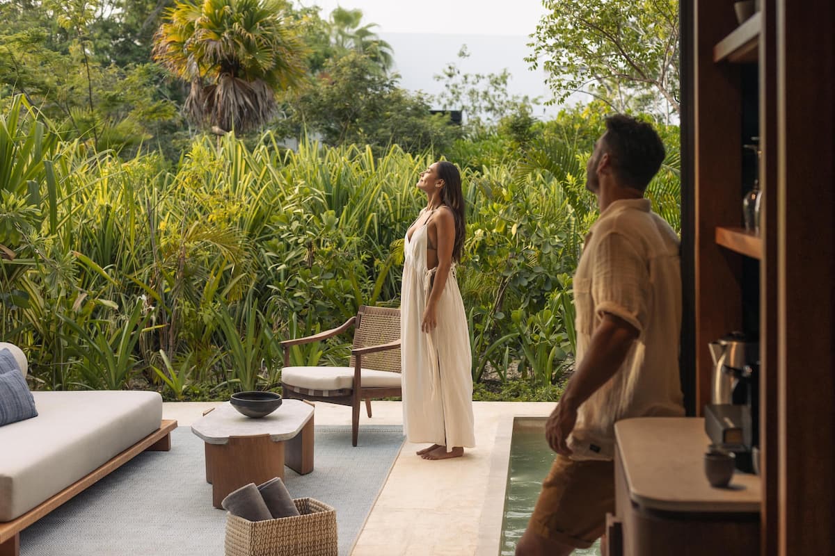 Premium bedding, free minibar items, in-room safe, laptop workspace