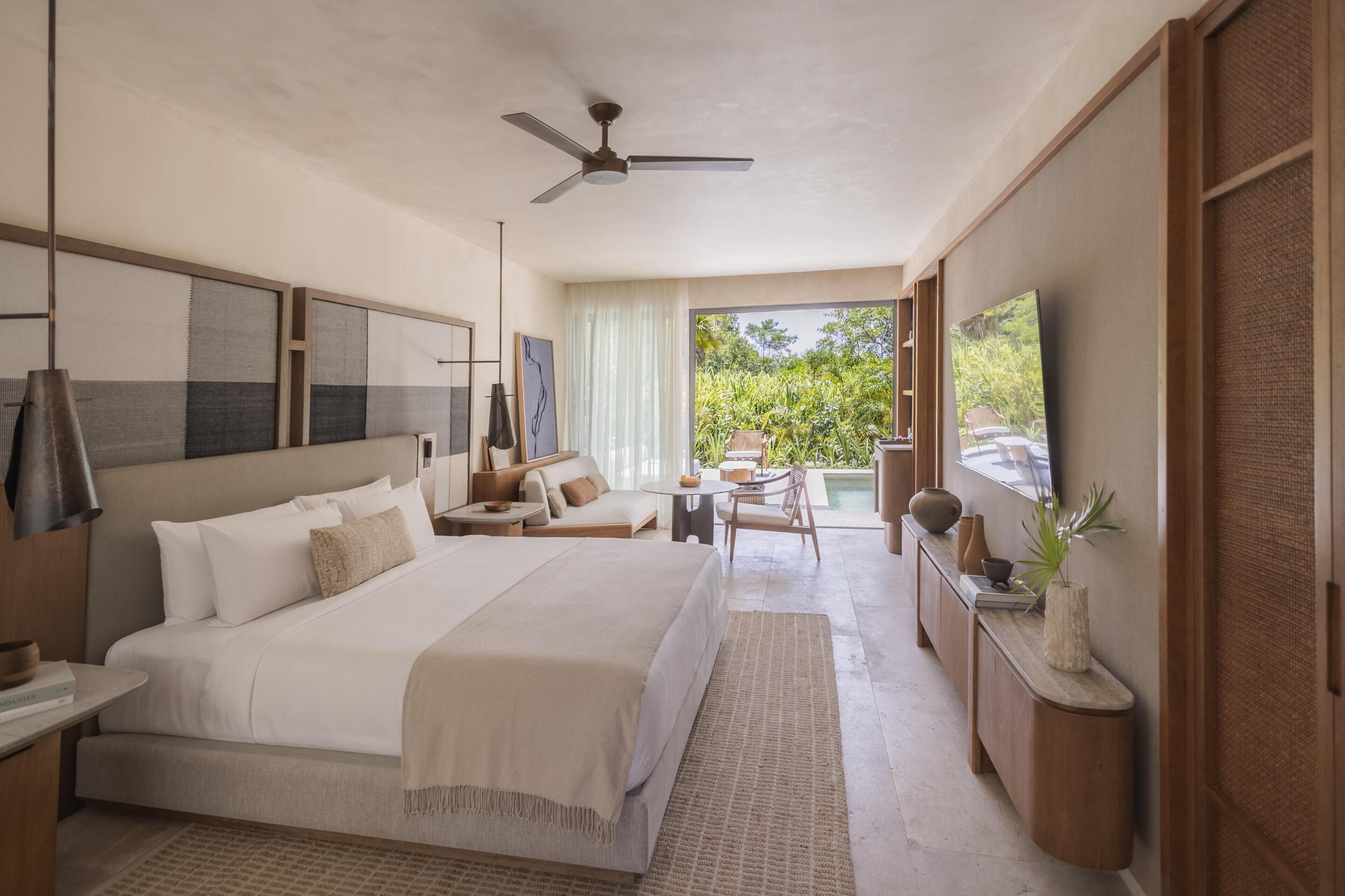 Luxe beddengoed, een minibar met enkele gratis items