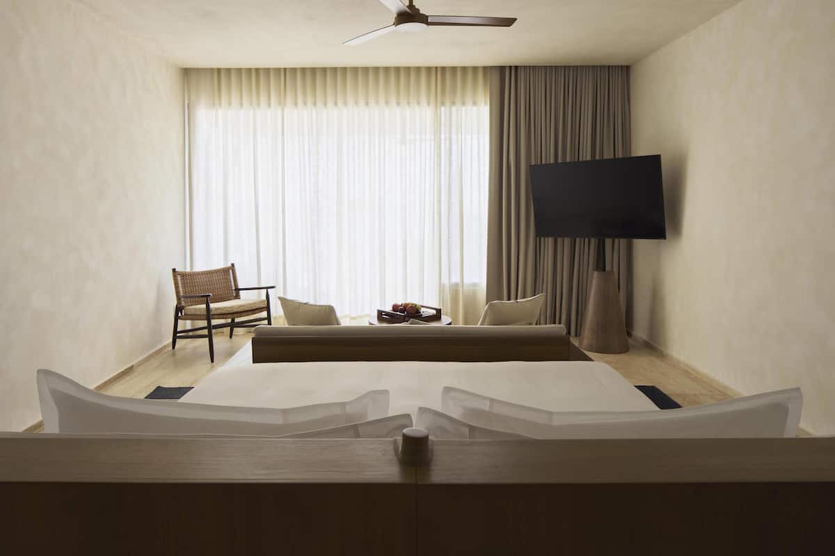 Premium bedding, minibar (some free items), in-room safe