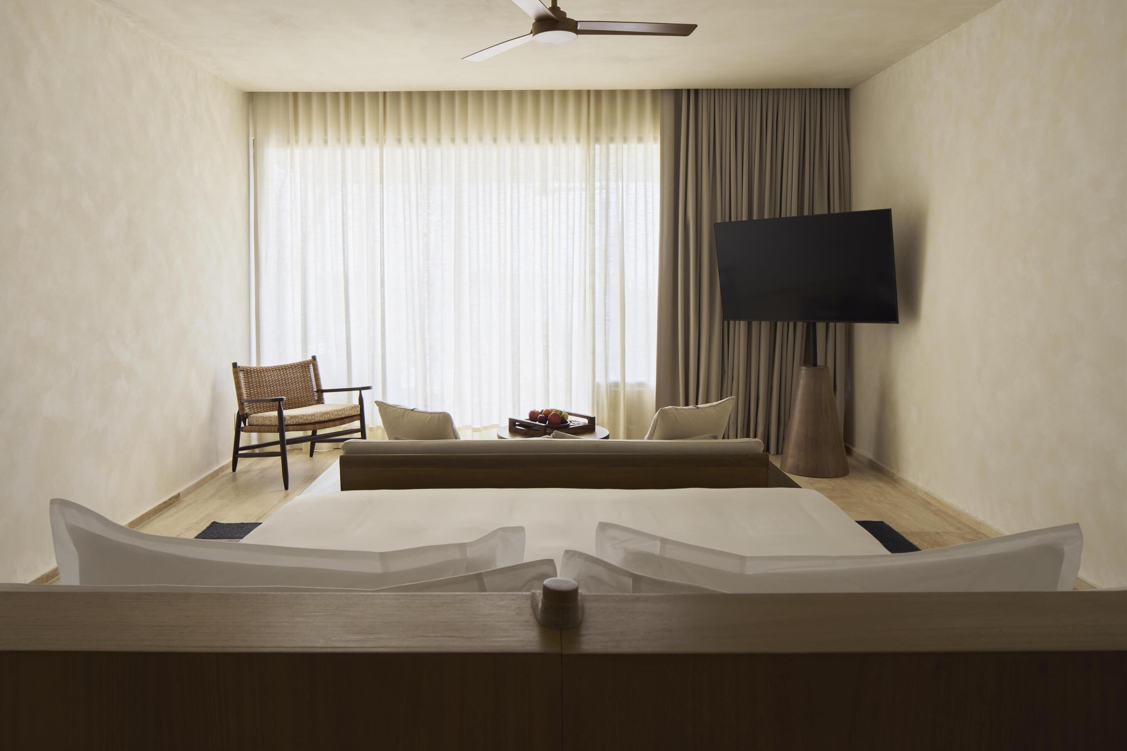 Premium bedding, free minibar items, in-room safe