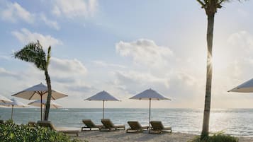 Private beach, white sand, free beach shuttle, sun loungers