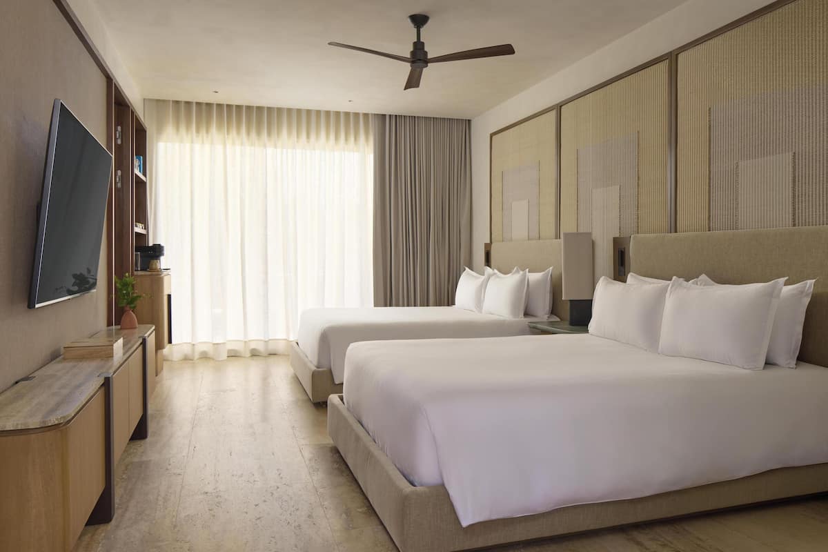 Premium bedding, minibar (some free items), in-room safe