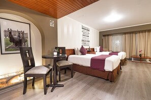 Luxe beddengoed, een minibar, een kluis op de kamer, geluiddichte muren