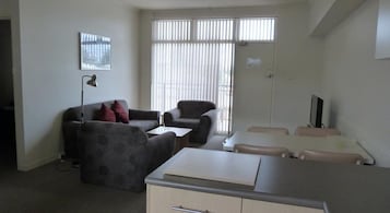 2 Bedroom Apartment | Living room | Flat-screen TV, DVD player