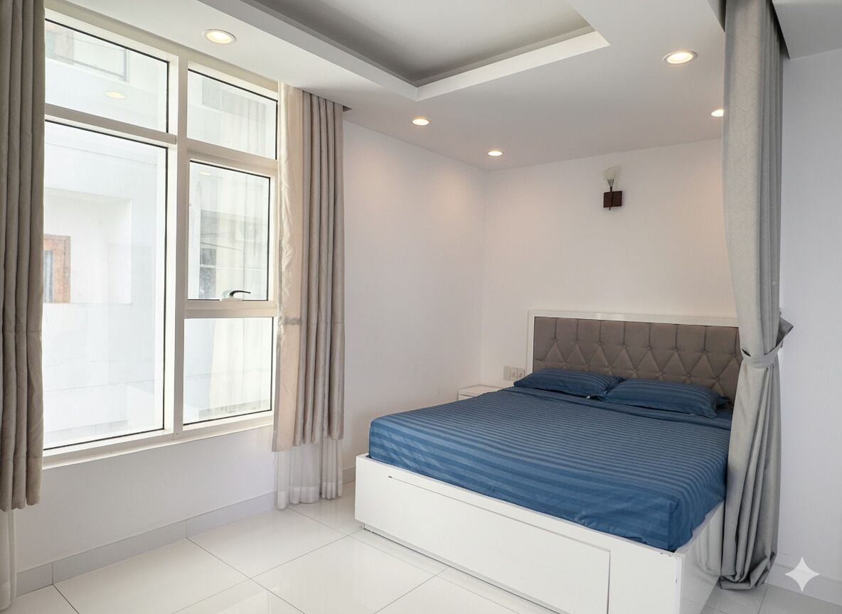 Two-bedroom Apartment with Balcony and Side Sea View  | Blackout drapes, iron/ironing board, free WiFi