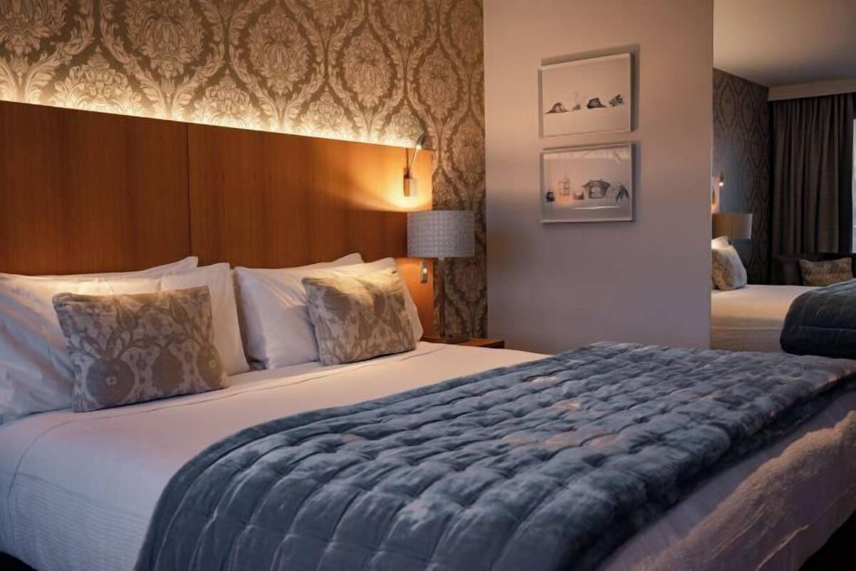 Premium bedding, desk, blackout curtains, soundproofing