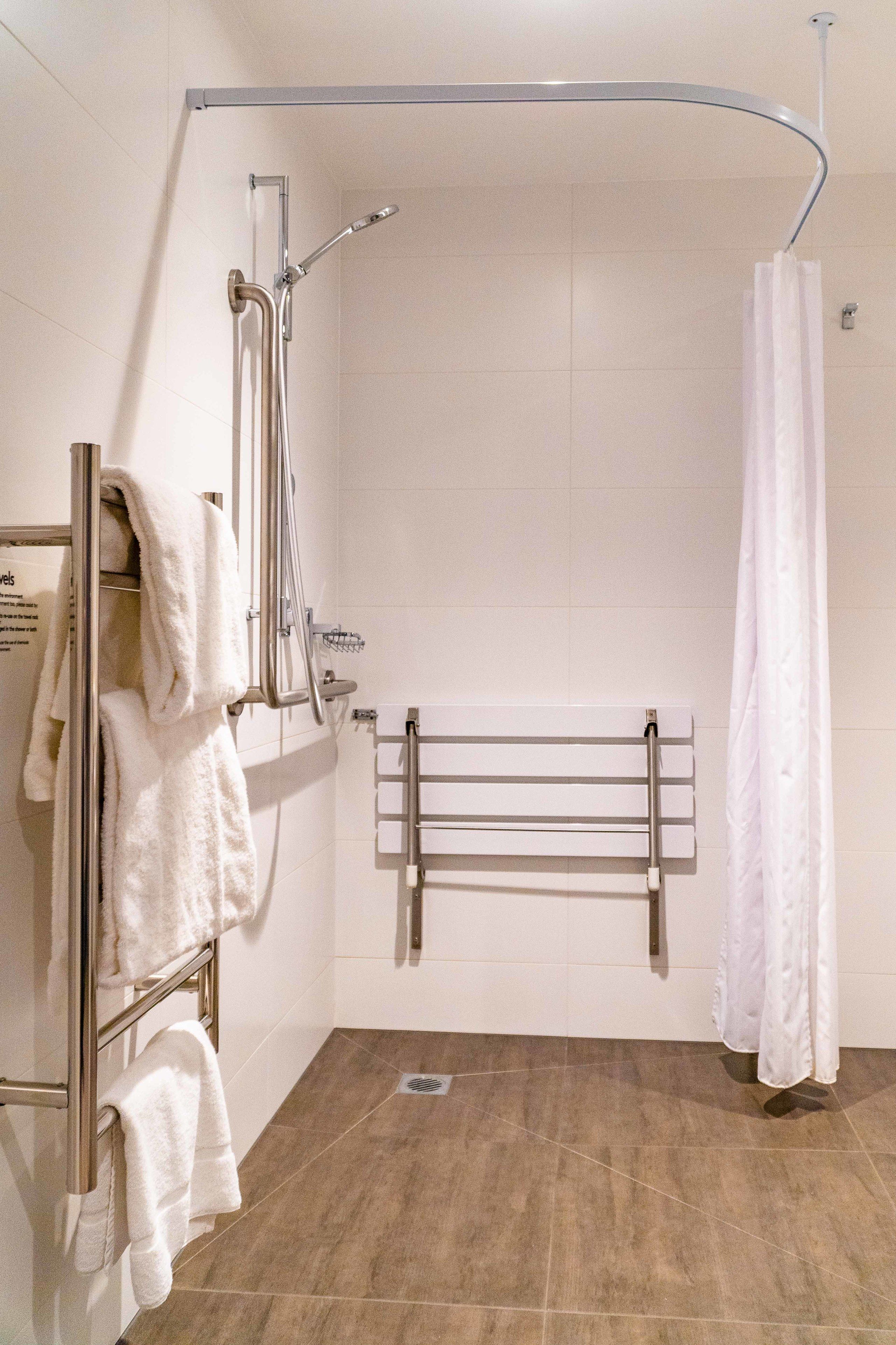deluxe accessible room | bathroom shower