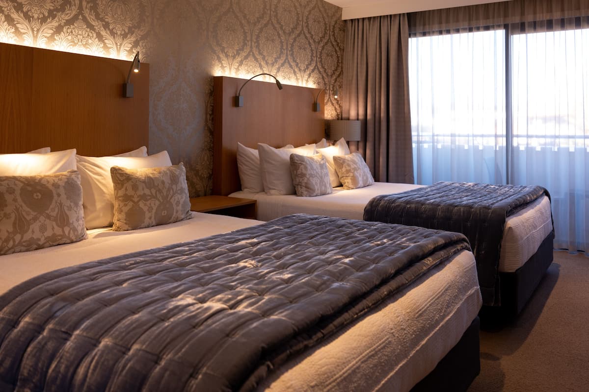 deluxe room (twin) | premium bedding, desk, blackout curtains, soundproofing