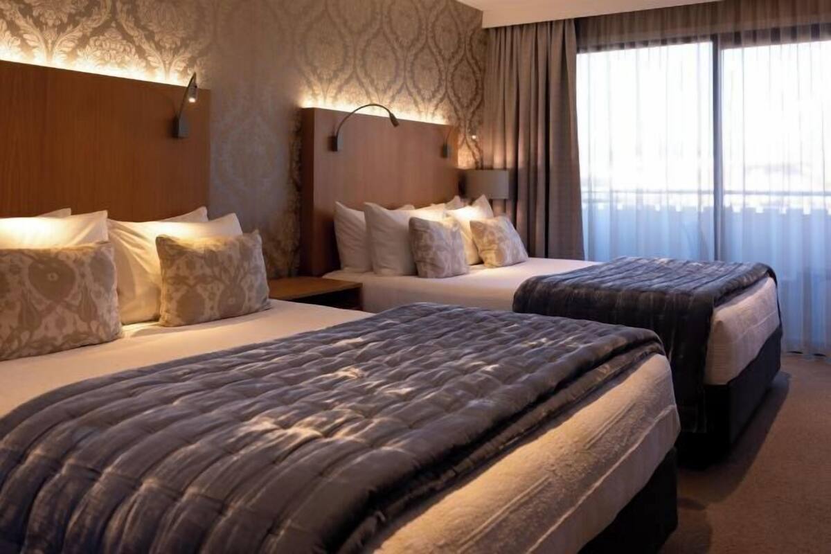 Premium bedding, desk, blackout curtains, soundproofing