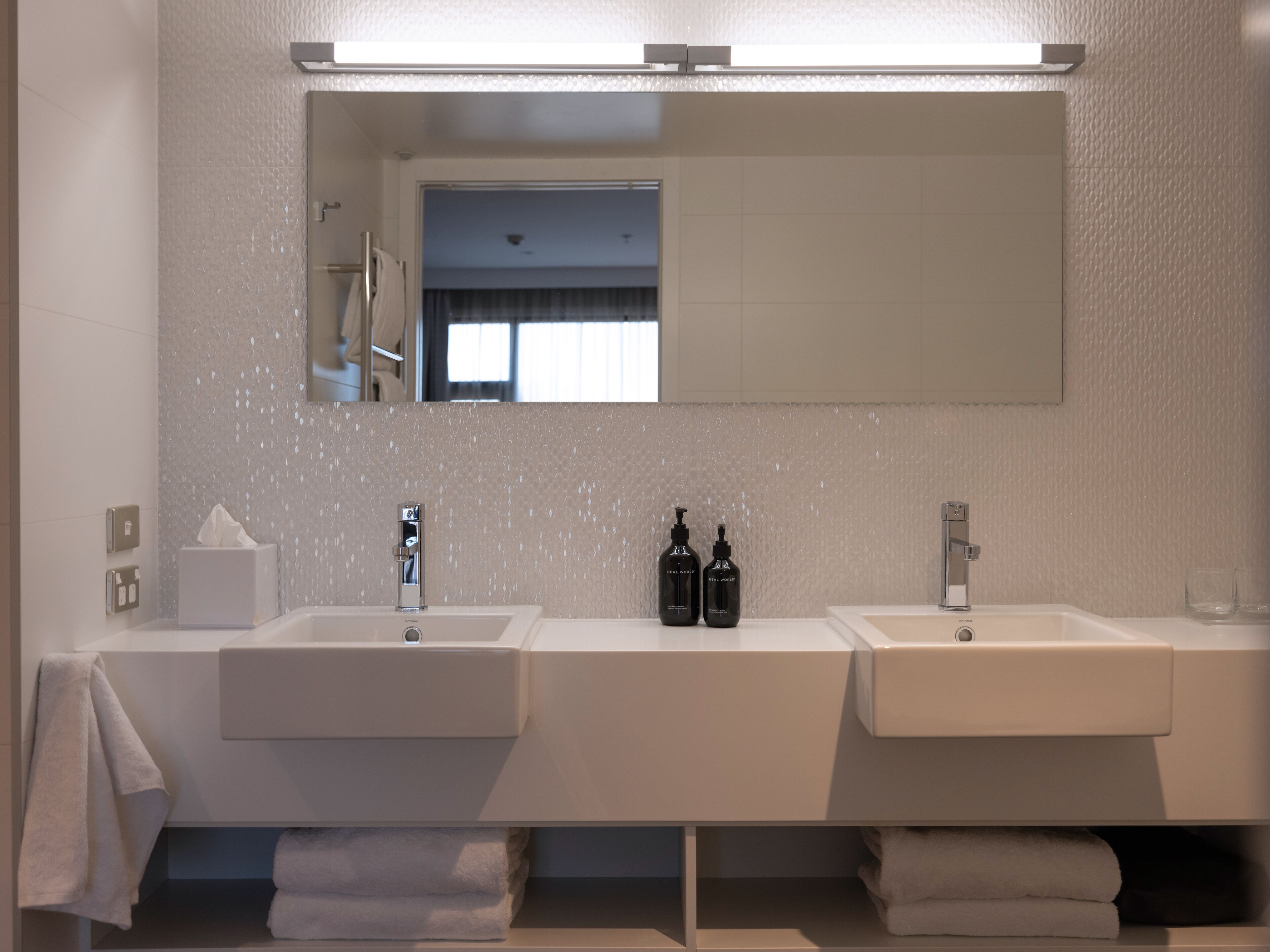 hair dryer, bathrobes, slippers, towels