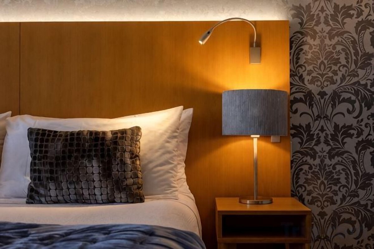 Premium bedding, desk, blackout curtains, soundproofing