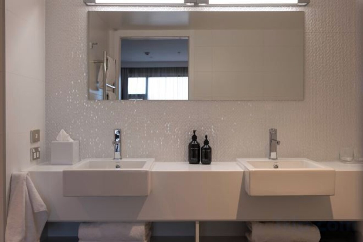 Bathroom | Hair dryer, bathrobes, slippers, towels